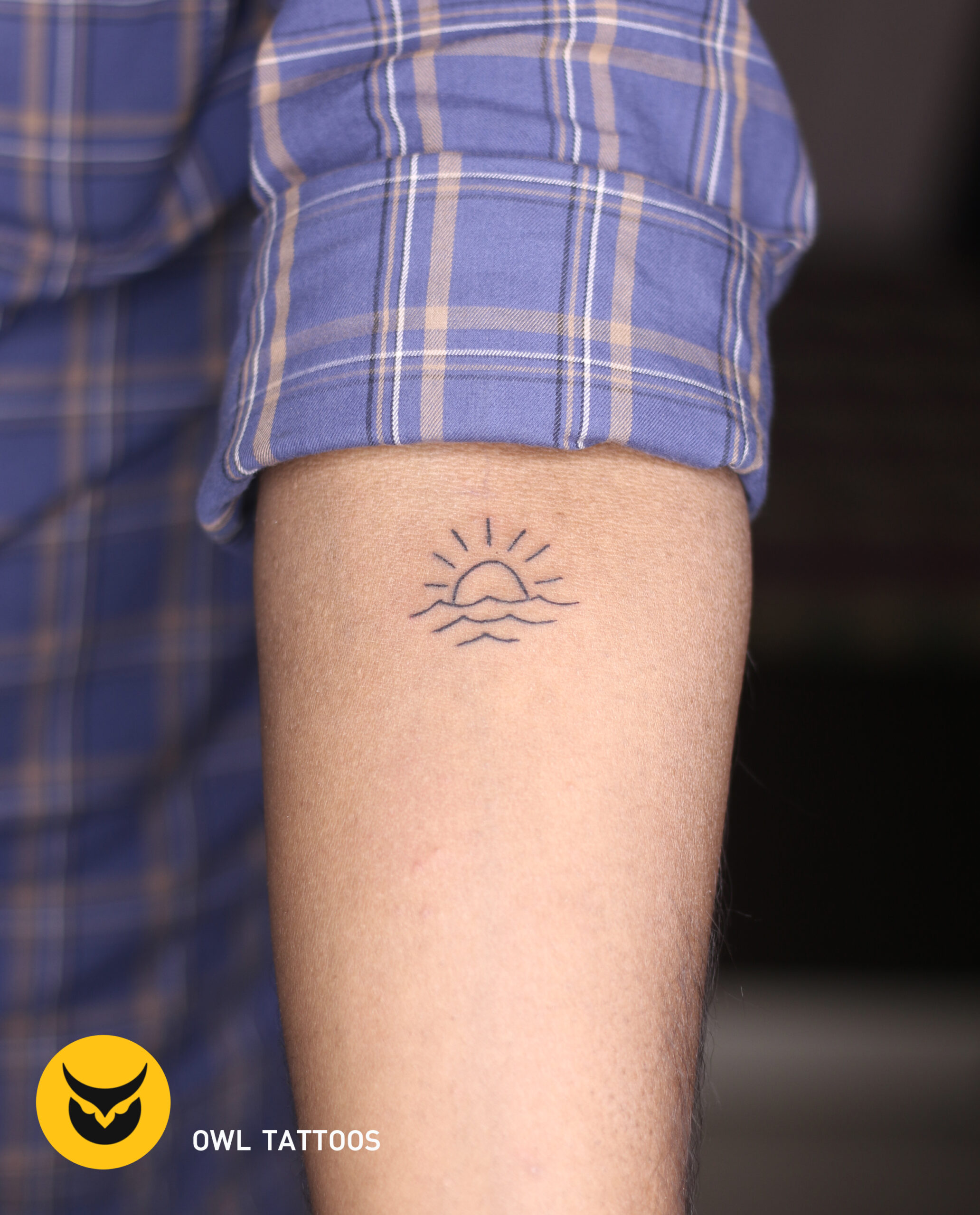 sun minimal tattoo